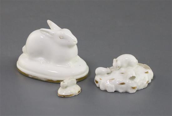 A Rockingham porcelain figure of a hare and two toy groups of rabbits, c.1830, l. 2cm - 6cm (3)